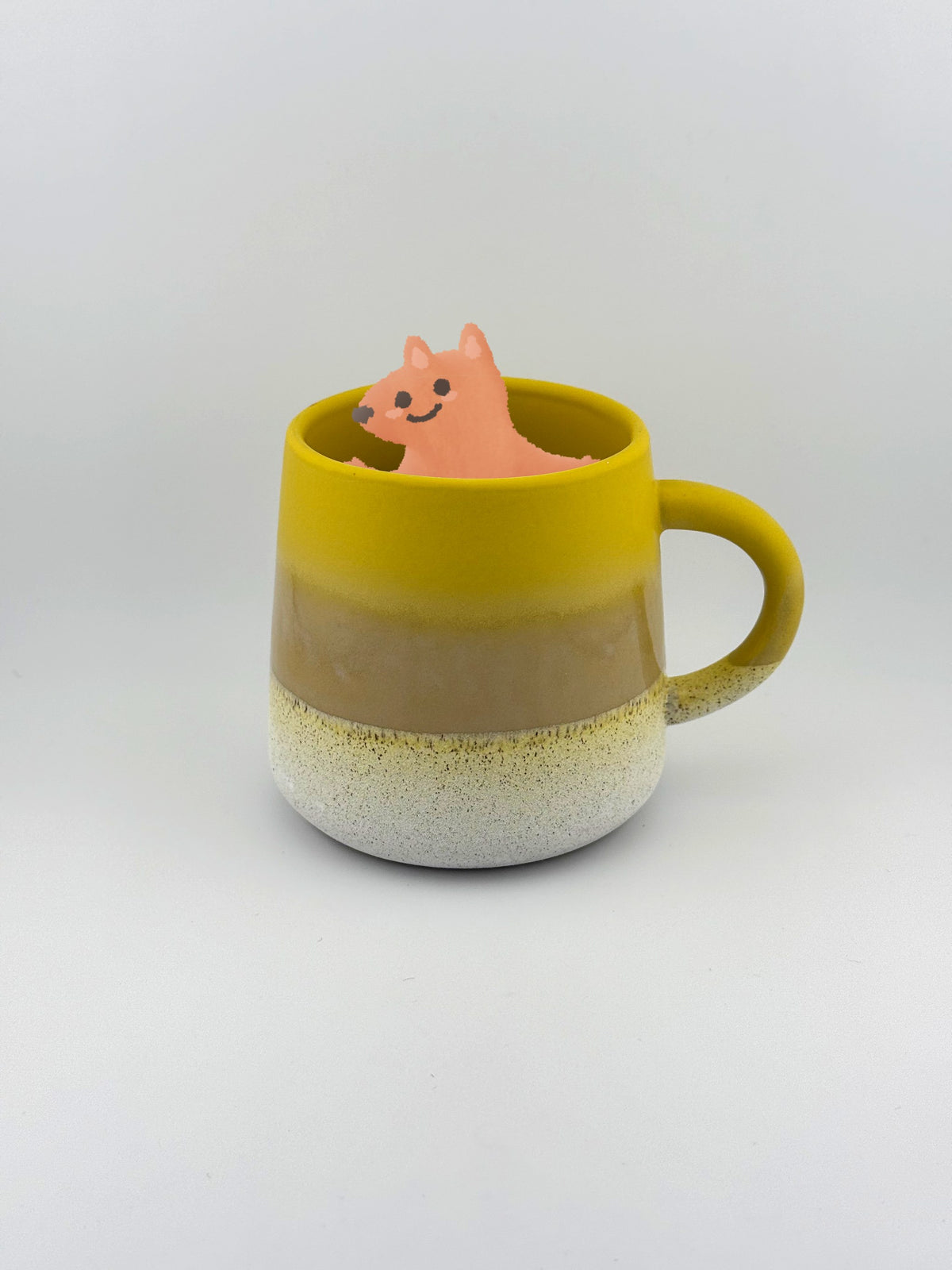 Mojave Glaze Yellow Mug with the Glimmers fox inside